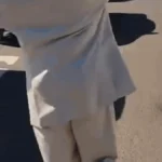 Brazil street vendor sells water, spreads education in sharp suit