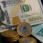 Brazil Real Strengthens as Central Bank Cuts Rates to 14%